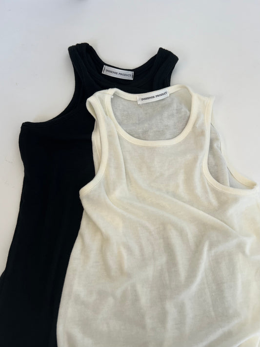 Soft Sleeveless Top In Black And White